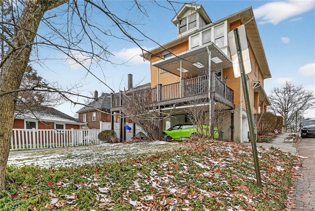 198 Dewey Street Pittsburgh, PA 15218 - Photo 45 of 45 a view of a house with a yard