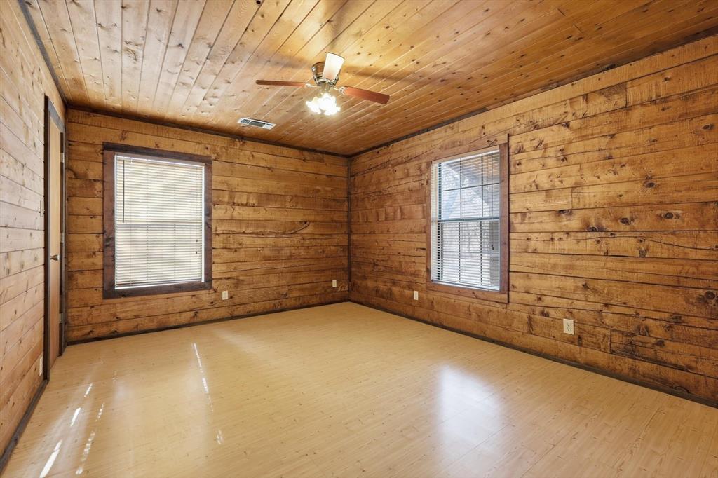 504 Windsor Lane Springtown, TX 76082 - Photo 30 of 40 a view of an empty room with a window