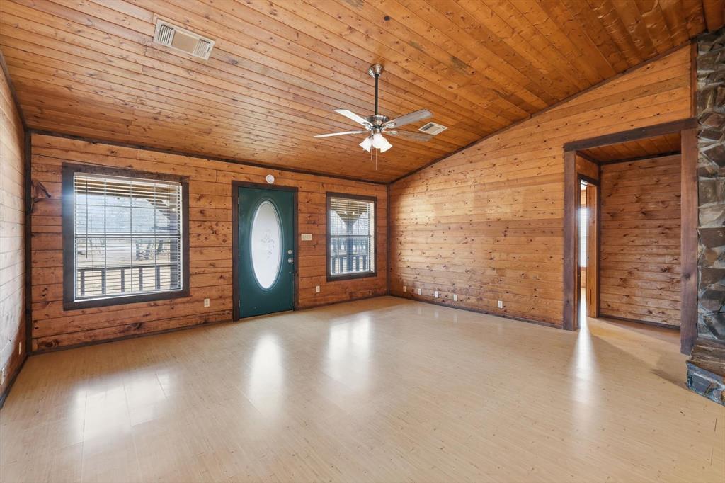 504 Windsor Lane Springtown, TX 76082 - Photo 7 of 40 an empty room with windows