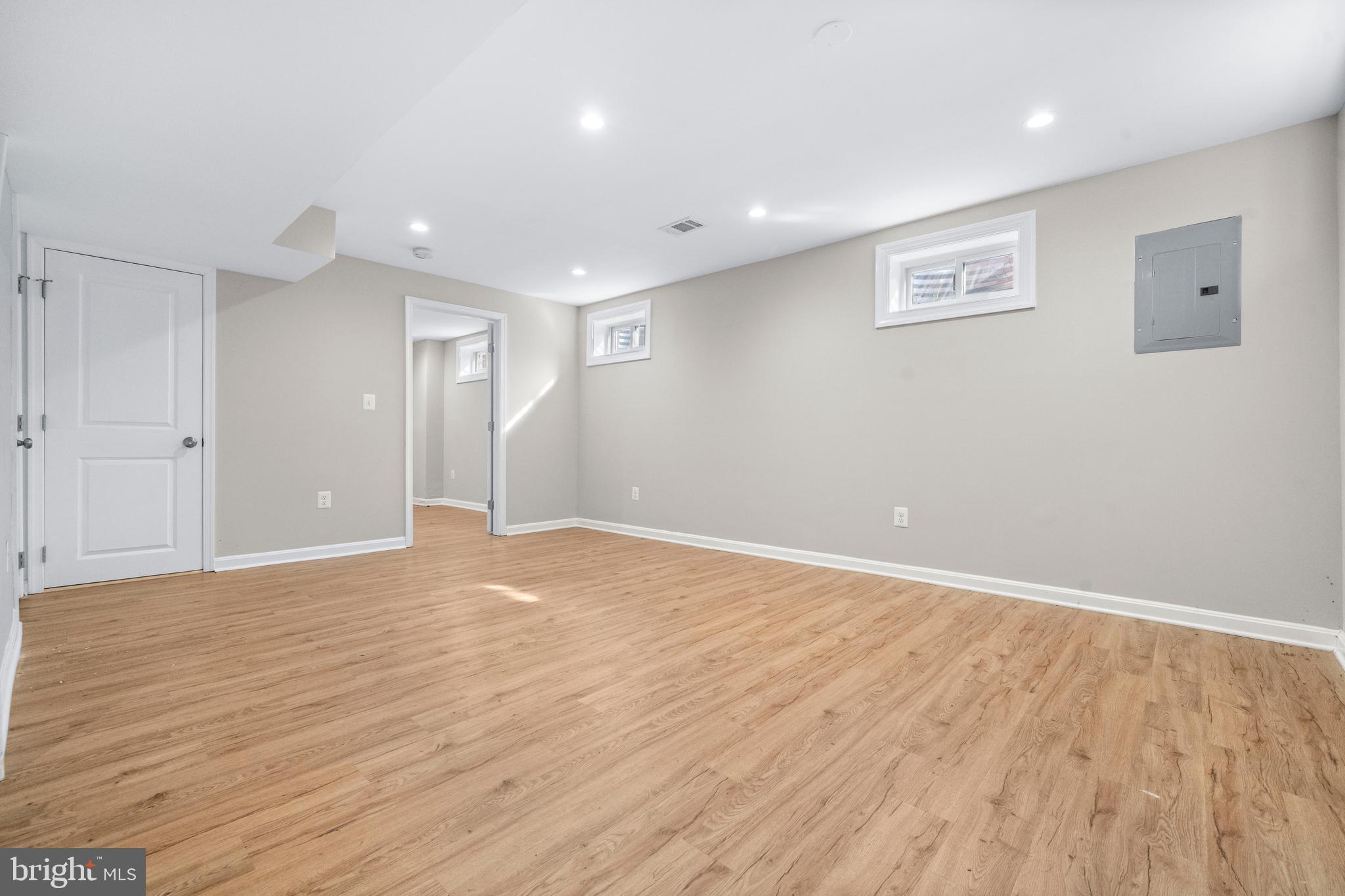 4314 Wheeler Road Southeast Washington, DC 20032 - Photo 25 of 36 a view of an empty room with wooden floor and a window