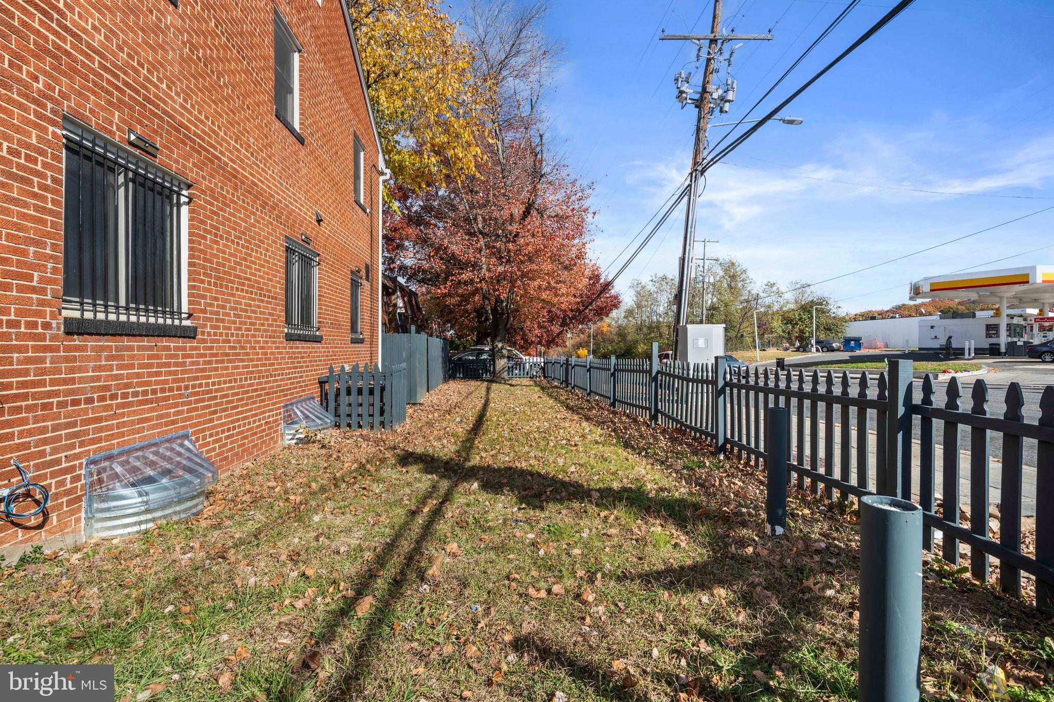 4314 Wheeler Road Southeast Washington, DC 20032 - Photo 30 of 36 a view of a house with snow on the roof