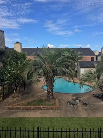 a view of a yard with an outdoor space