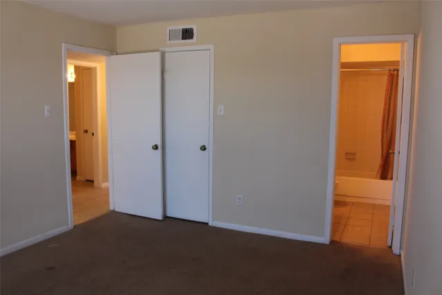 a bathroom with a toilet a sink and bathtub
