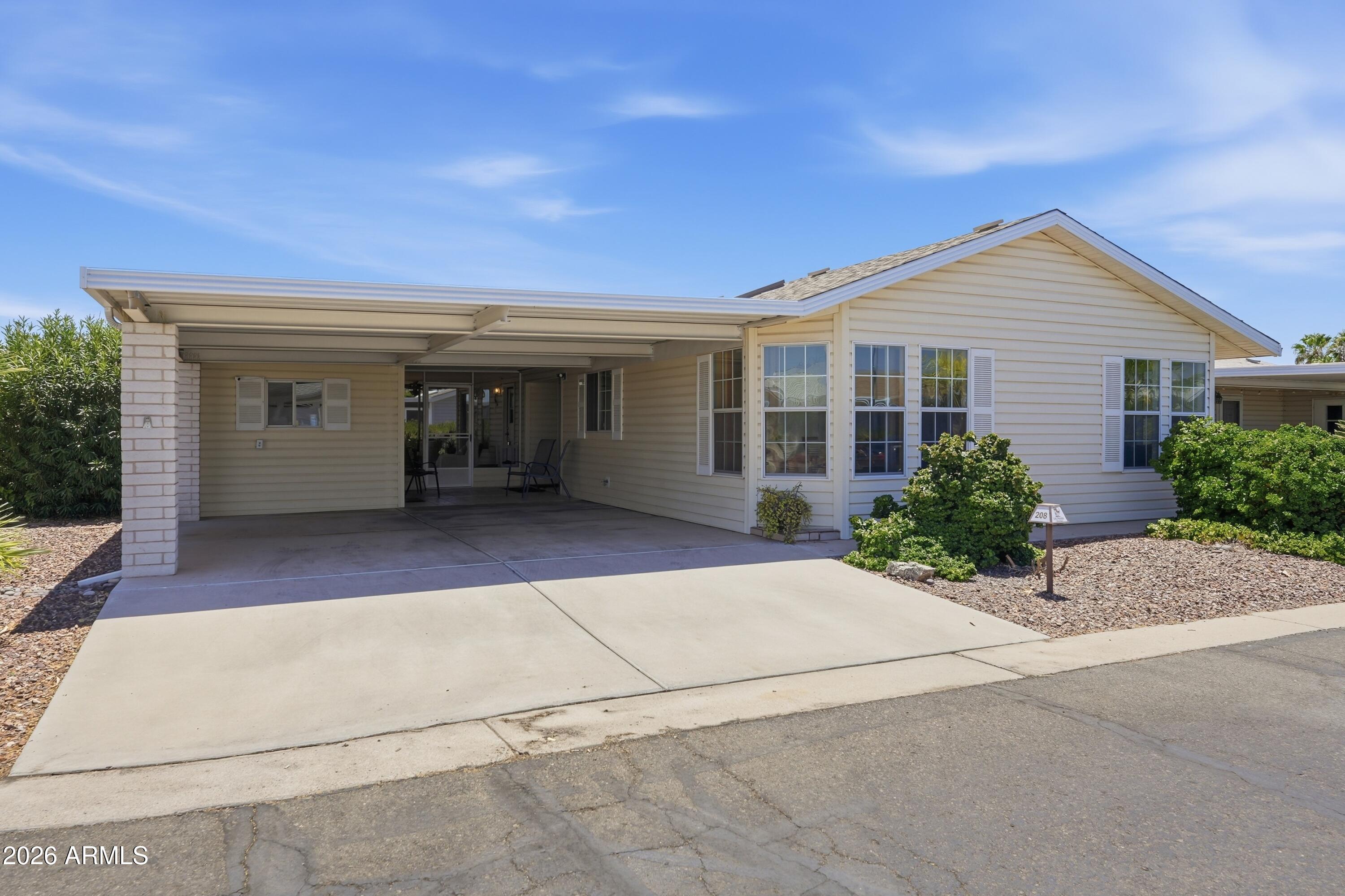 2550 South Ellsworth Road, Unit 208 Mesa, AZ 85209 - Photo 42 of 44 Covered 2-car carport