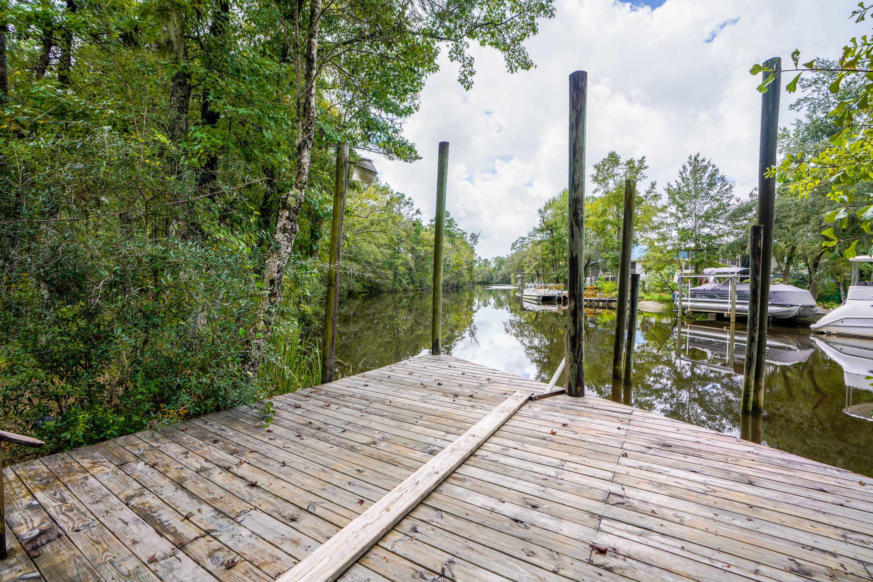 280 Alaqua Cove Road Freeport, FL 32439 - Photo 11 of 41 Dock and Piling Slip