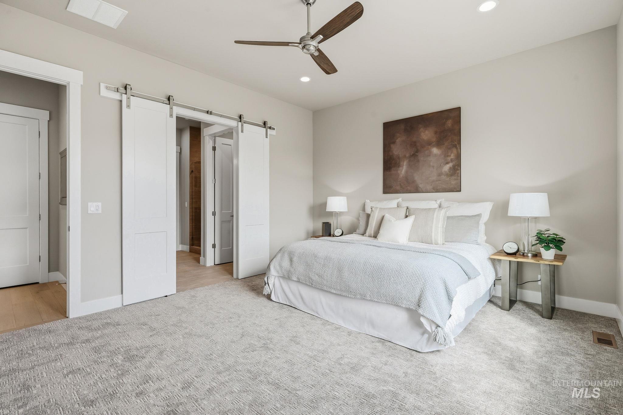470 South Radiator Way Boise, ID 83716 - Photo 39 of 50 Bedroom featuring a ceiling fan with wood-finish blades, recessed lighting, and light-toned carpeting