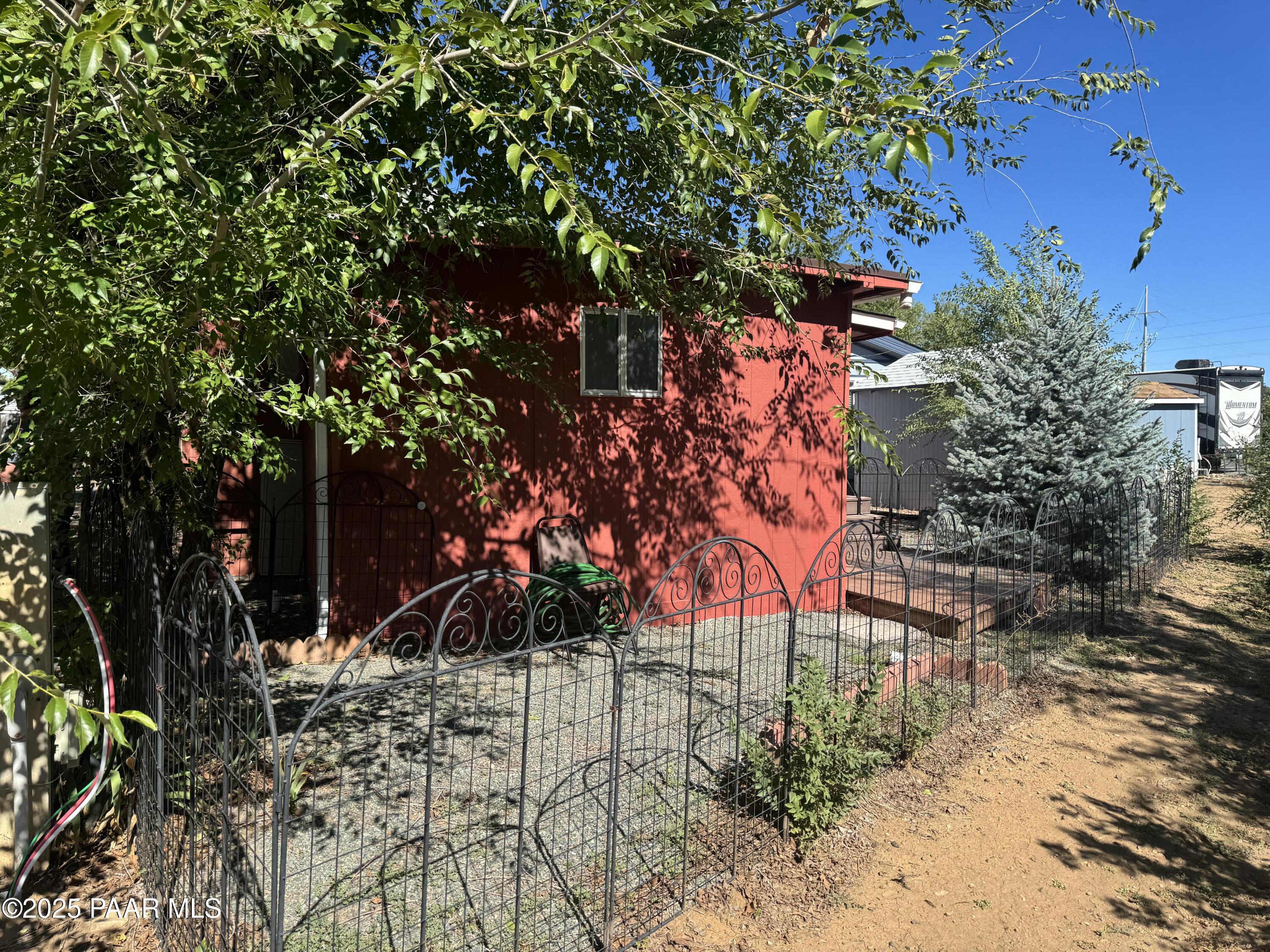 11250 East State Rte 69, Unit 80 Prescott Valley, AZ 86314 - Photo 13 of 13 a view of a backyard of the house