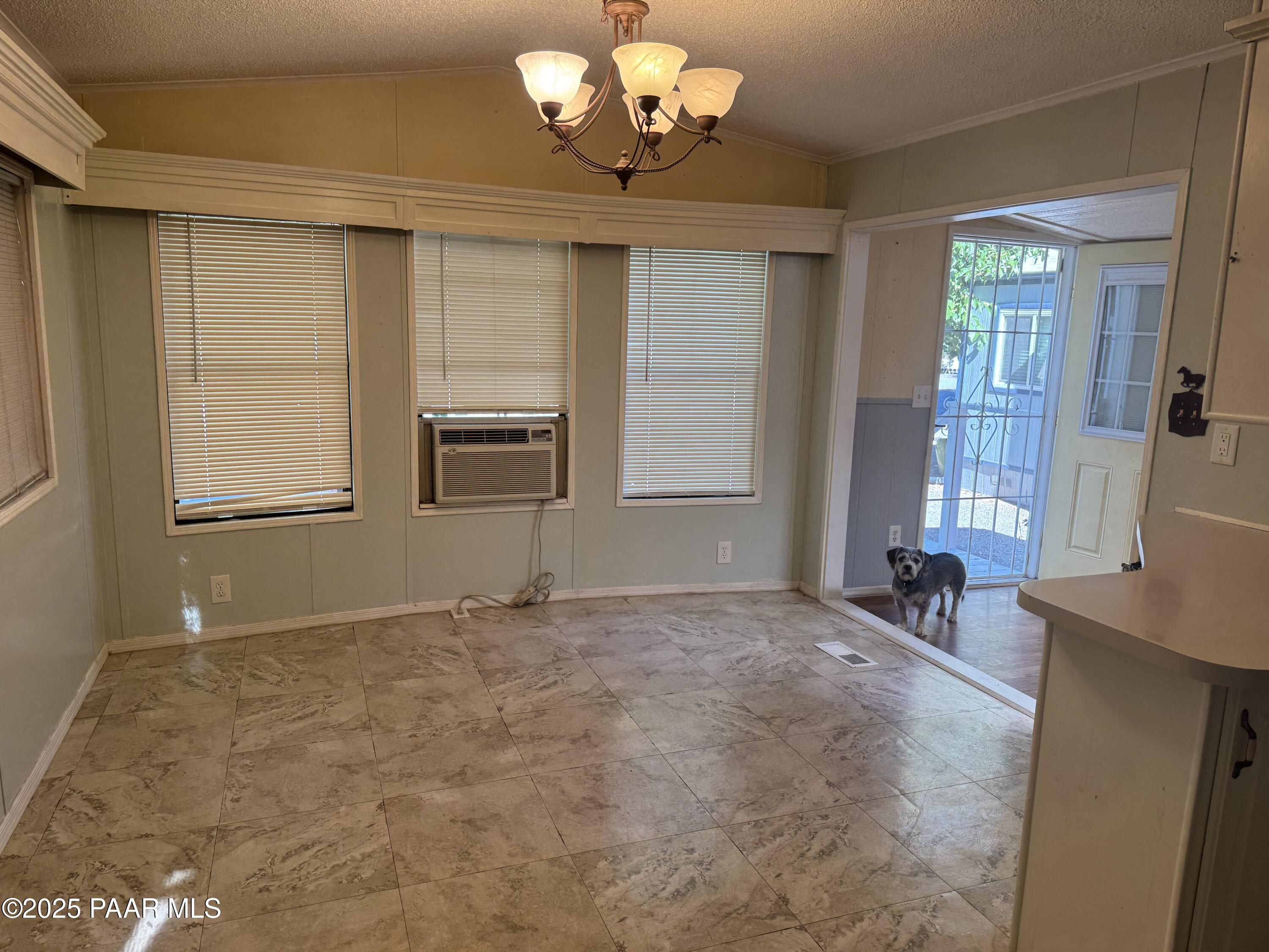 11250 East State Rte 69, Unit 80 Prescott Valley, AZ 86314 - Photo 2 of 13 a view of an empty room with a window