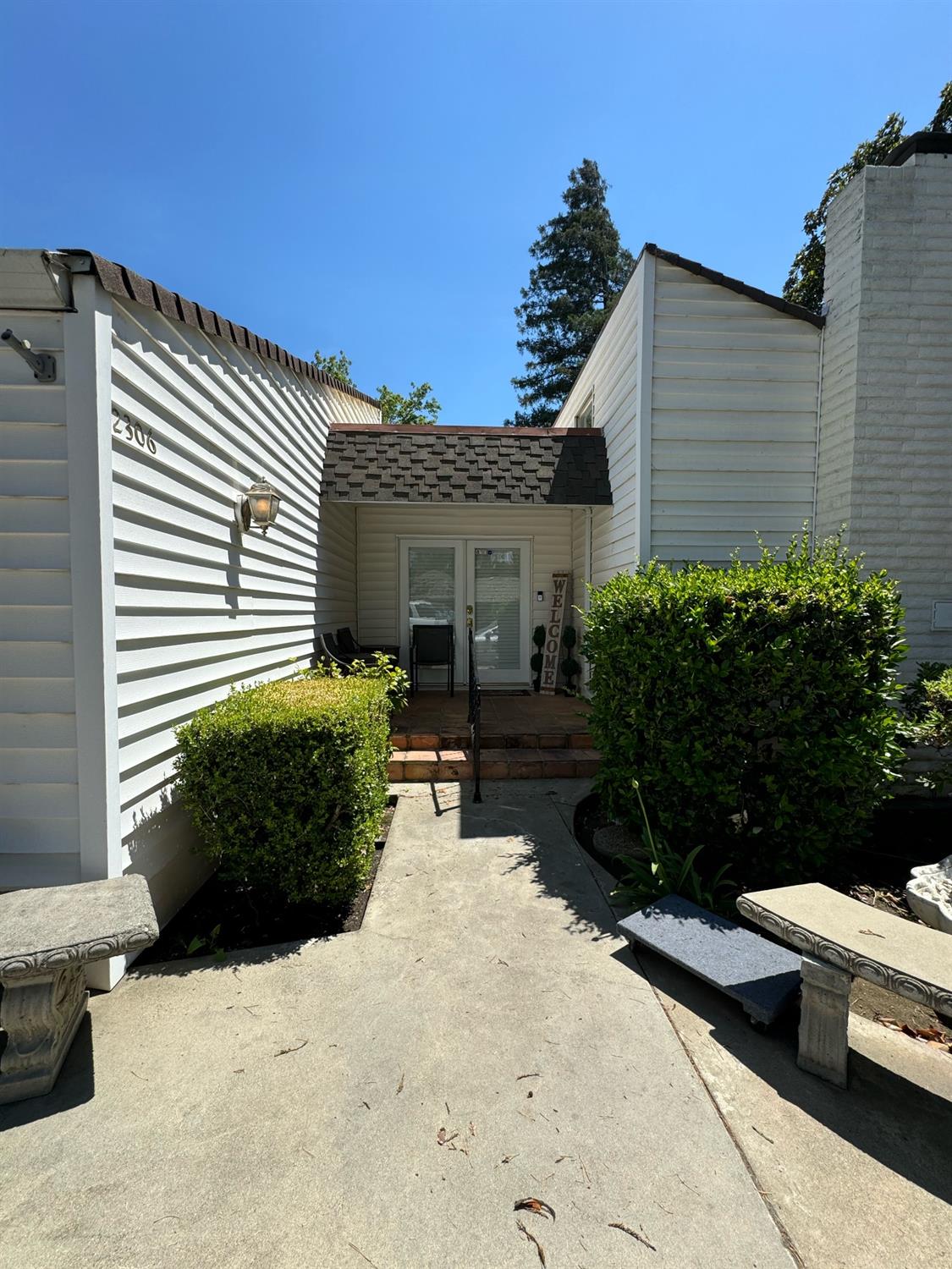 2306 Carmichael Way Turlock, CA 95382 - Photo 1 of 1 a view of a house with backyard and sitting area