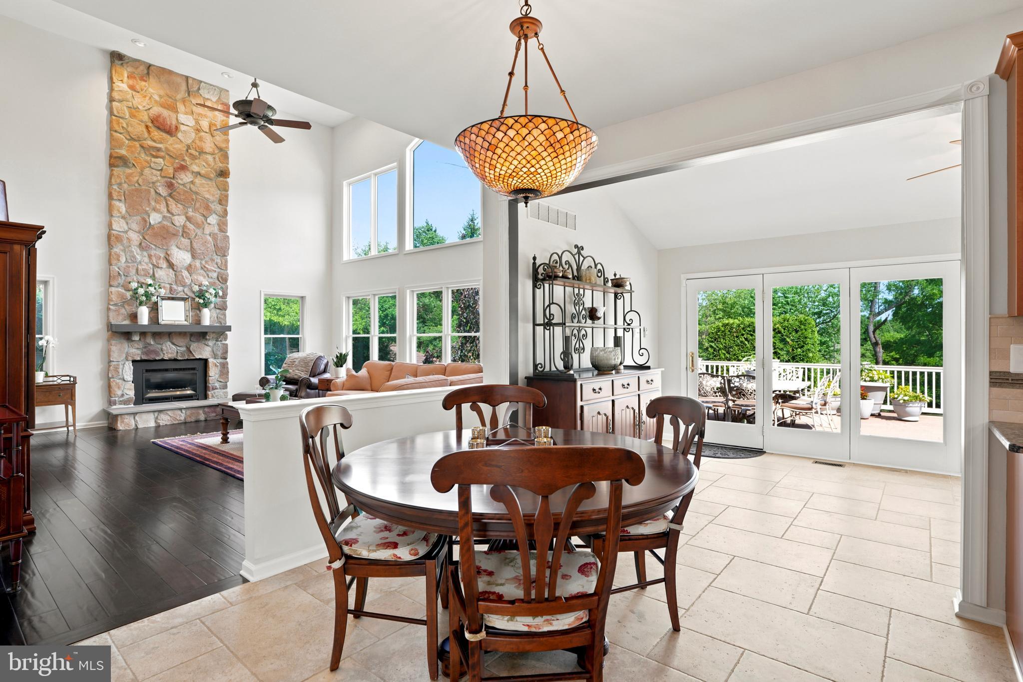 2303 Redtail Road Norristown, PA 19403 - Photo 17 of 53 a dining room with furniture a chandelier and wooden floor