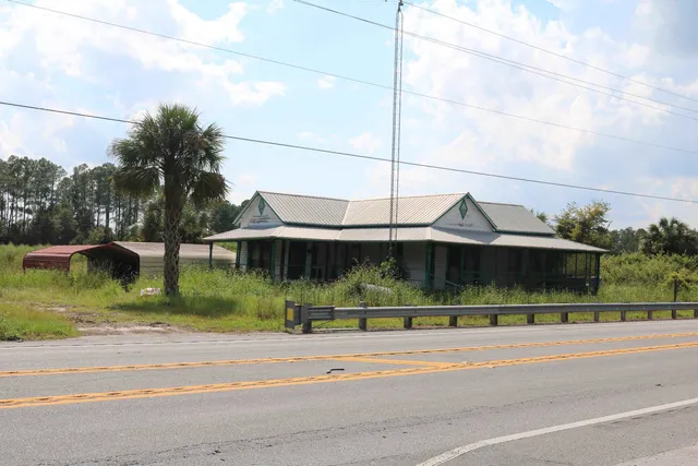 a view of street along with houses