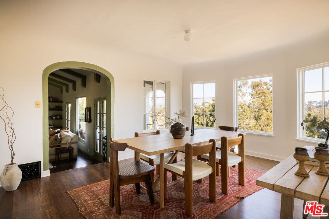 2226 Moreno Drive Los Angeles, CA 90039 - Photo 12 of 65 a view of a dining room with furniture and wooden floor