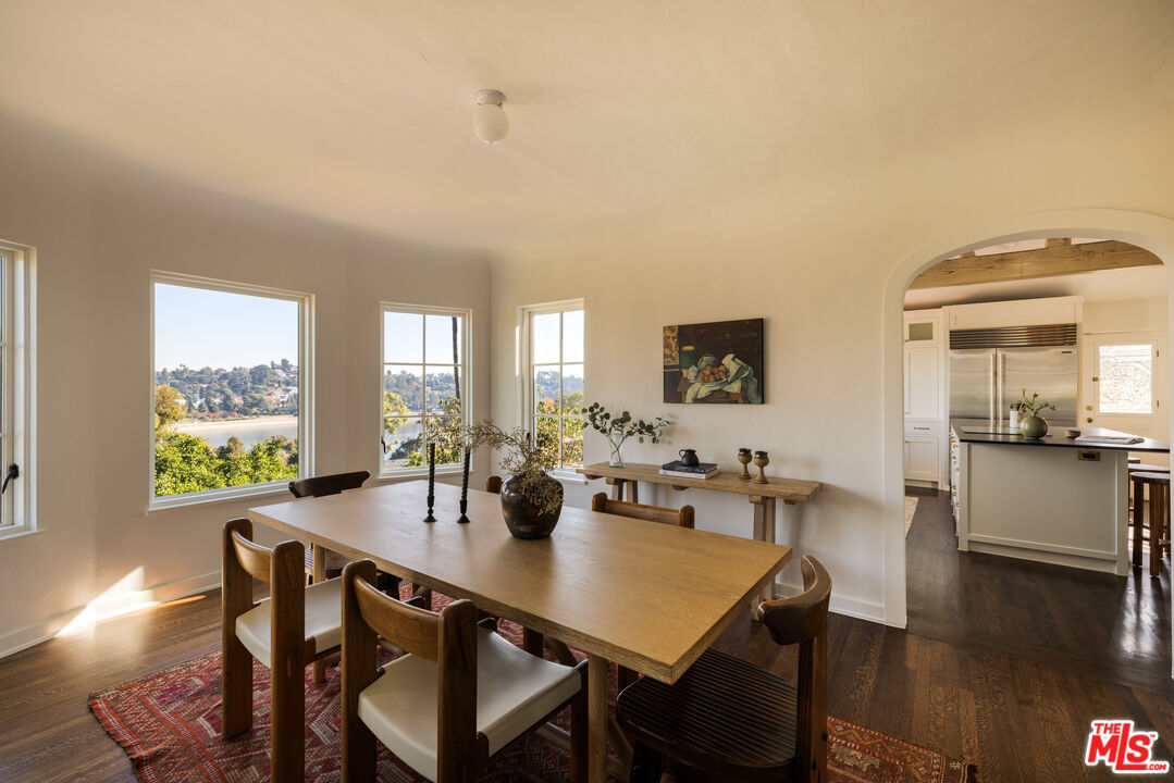 2226 Moreno Drive Los Angeles, CA 90039 - Photo 13 of 65 a view of a dining room with furniture and wooden floor