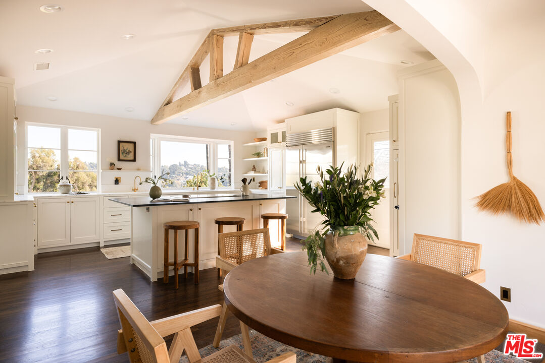 2226 Moreno Drive Los Angeles, CA 90039 - Photo 16 of 65 a dining room with furniture and wooden floor