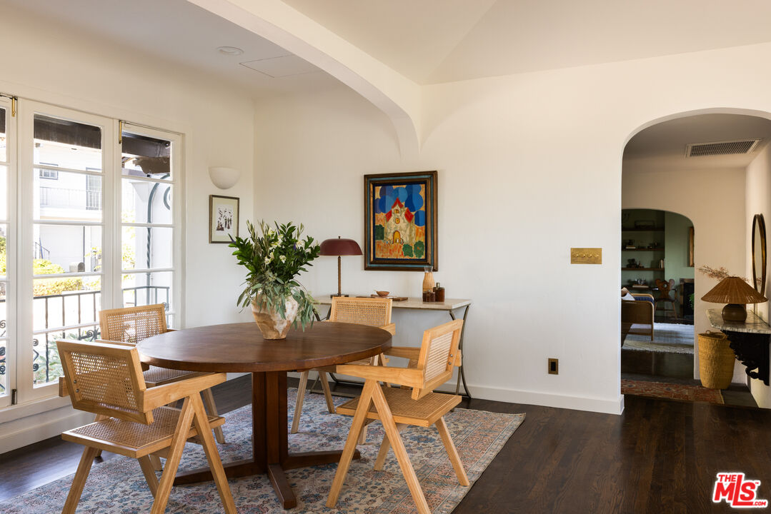 2226 Moreno Drive Los Angeles, CA 90039 - Photo 19 of 65 a view of a dining room with furniture and wooden floor