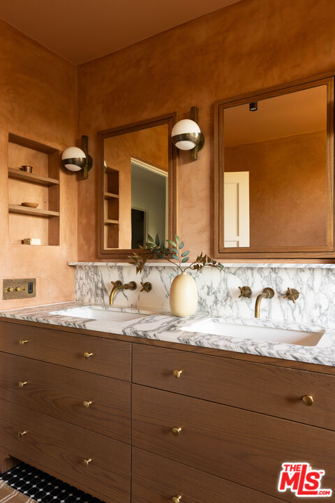 2226 Moreno Drive Los Angeles, CA 90039 - Photo 31 of 65 a bathroom with a granite countertop sink vanity mirror and a