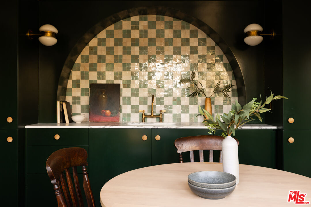 2226 Moreno Drive Los Angeles, CA 90039 - Photo 38 of 65 a bathroom with a sink and mirror