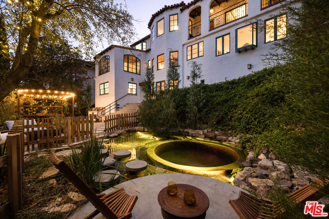 2226 Moreno Drive Los Angeles, CA 90039 - Photo 61 of 65 a view of a house with pool and chairs
