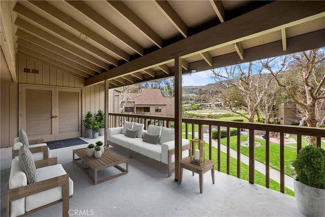 a balcony with furniture