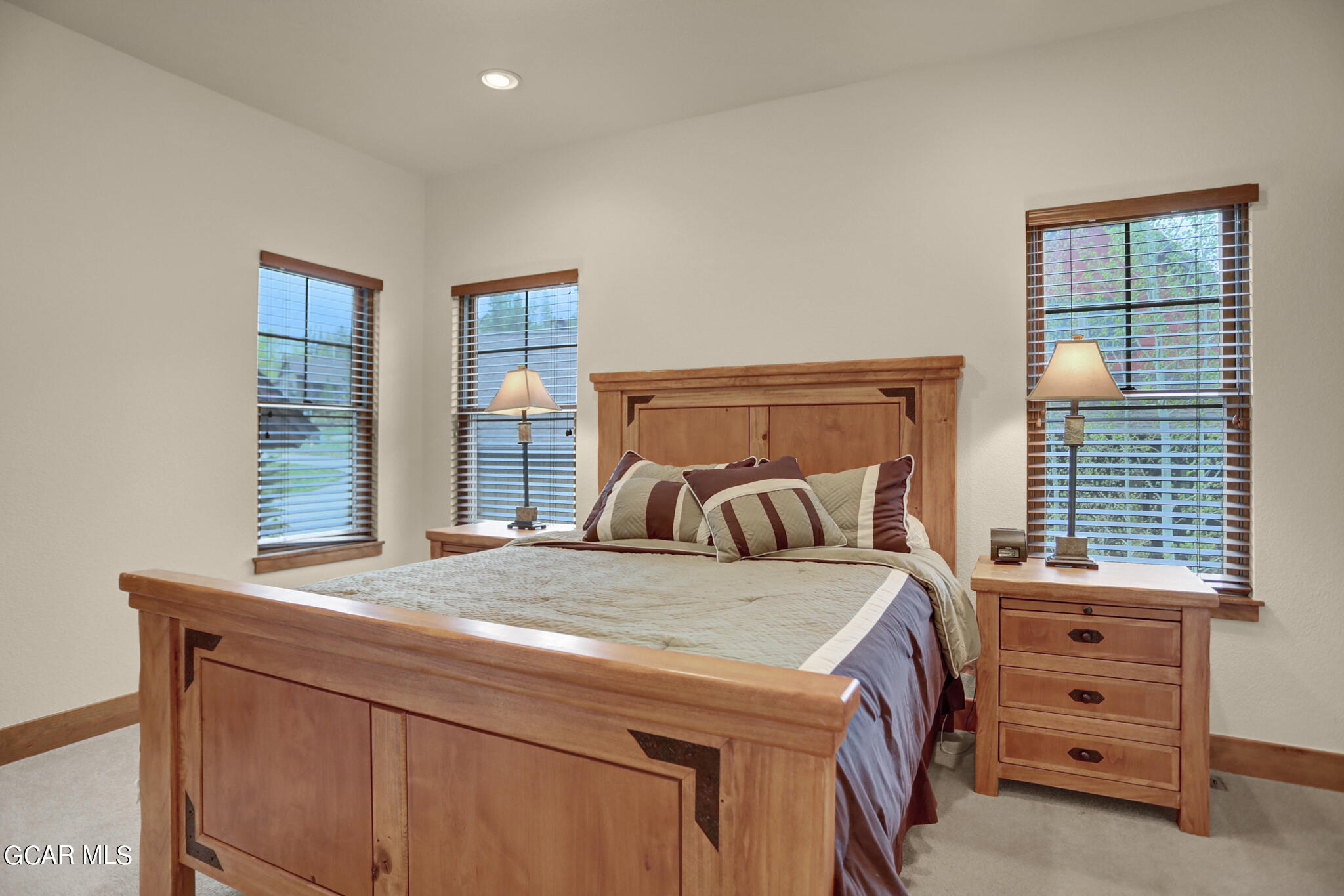 1180 Rendezvous Road Fraser, CO 80442 - Photo 27 of 44 a bedroom with a bed and a dresser