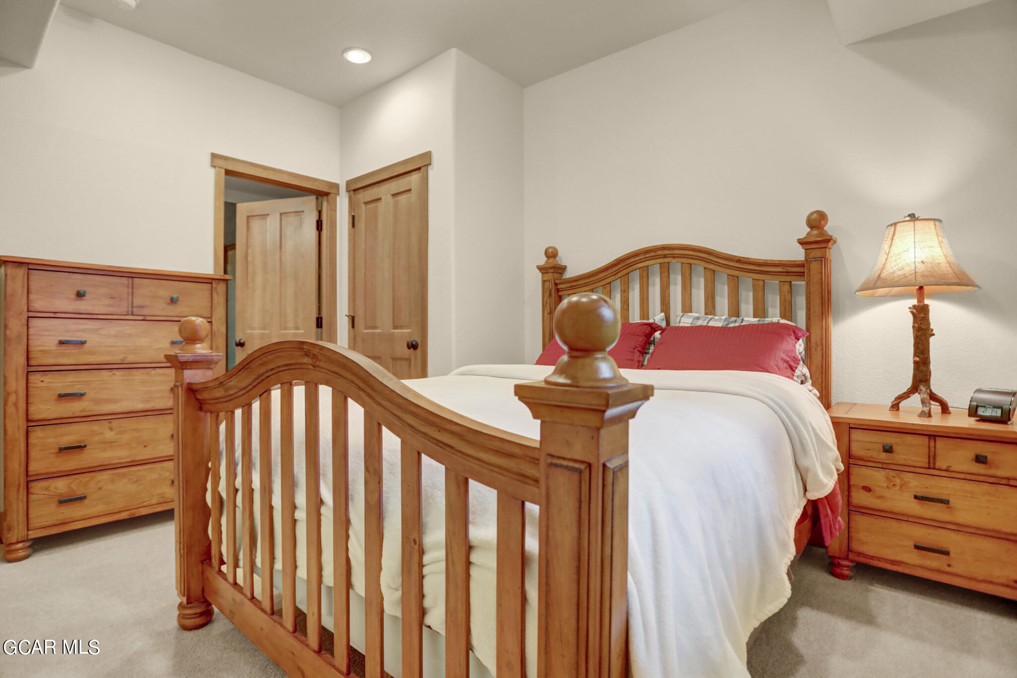 1180 Rendezvous Road Fraser, CO 80442 - Photo 31 of 44 a bedroom with a bed and a dresser