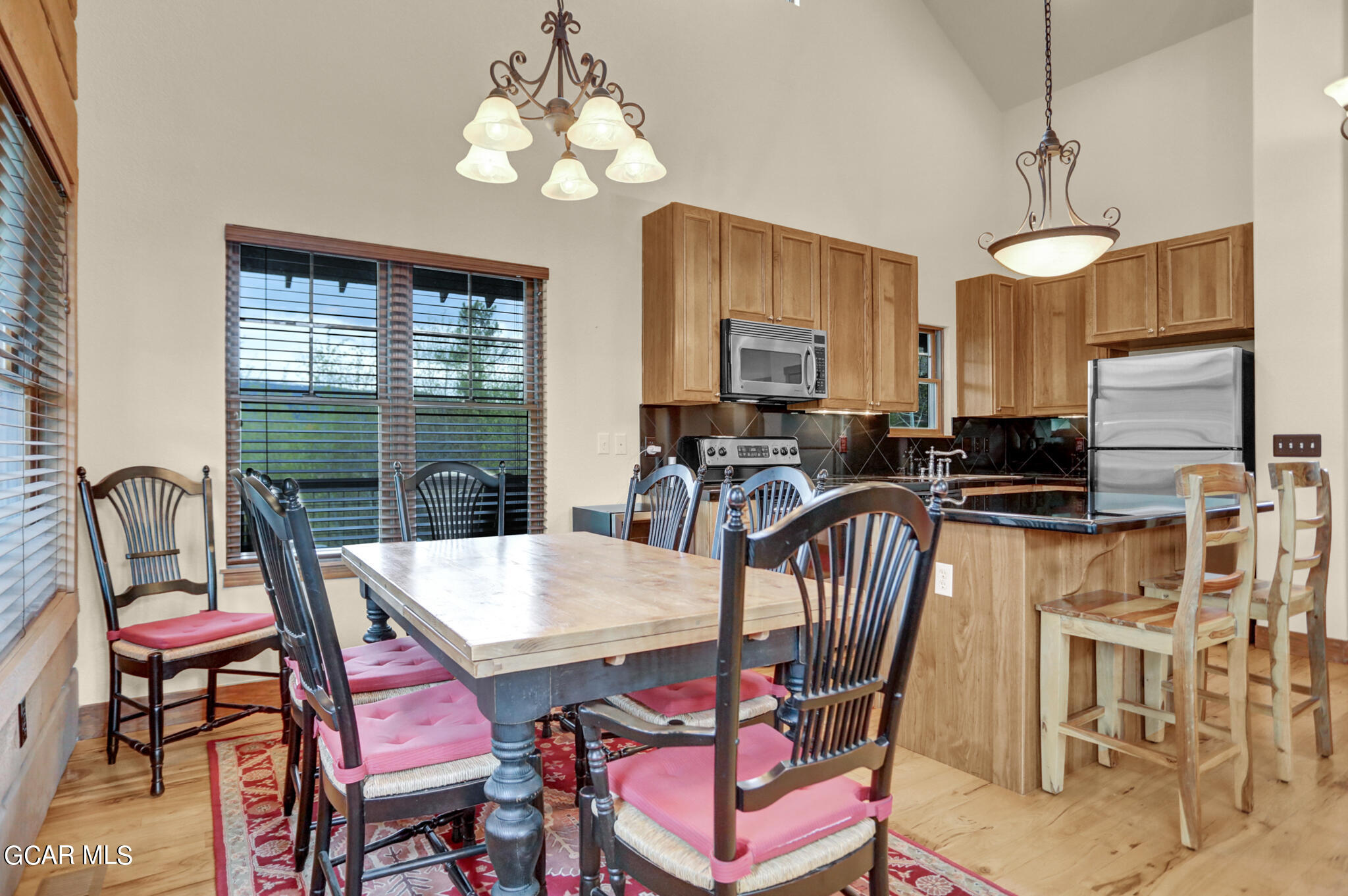 1180 Rendezvous Road Fraser, CO 80442 - Photo 10 of 44 a view of a dining room with furniture window and outside view