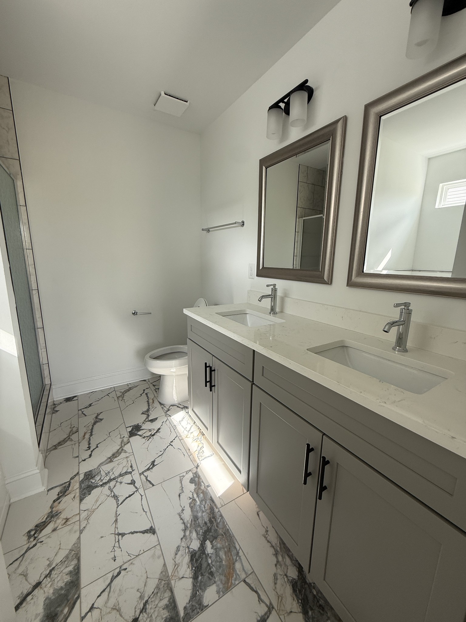 1166 Addler Drive Springfield, TN 37172 - Photo 5 of 10 a bathroom with a sink double vanity and a mirror