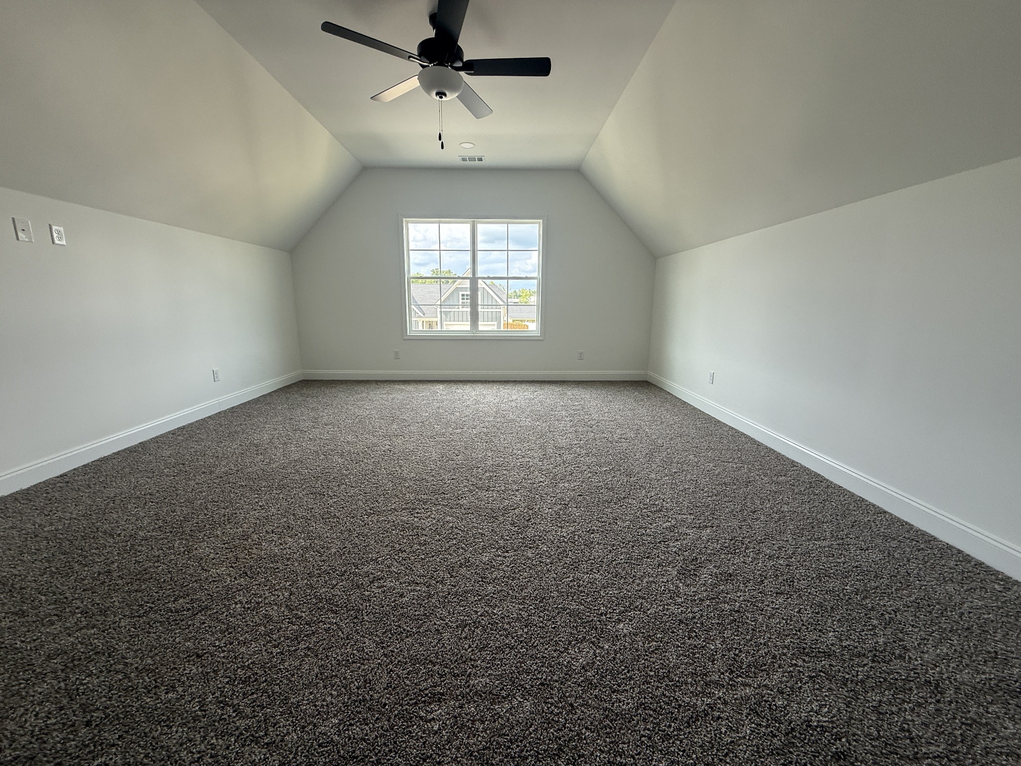 1166 Addler Drive Springfield, TN 37172 - Photo 10 of 10 an empty room with a chandelier fan and windows