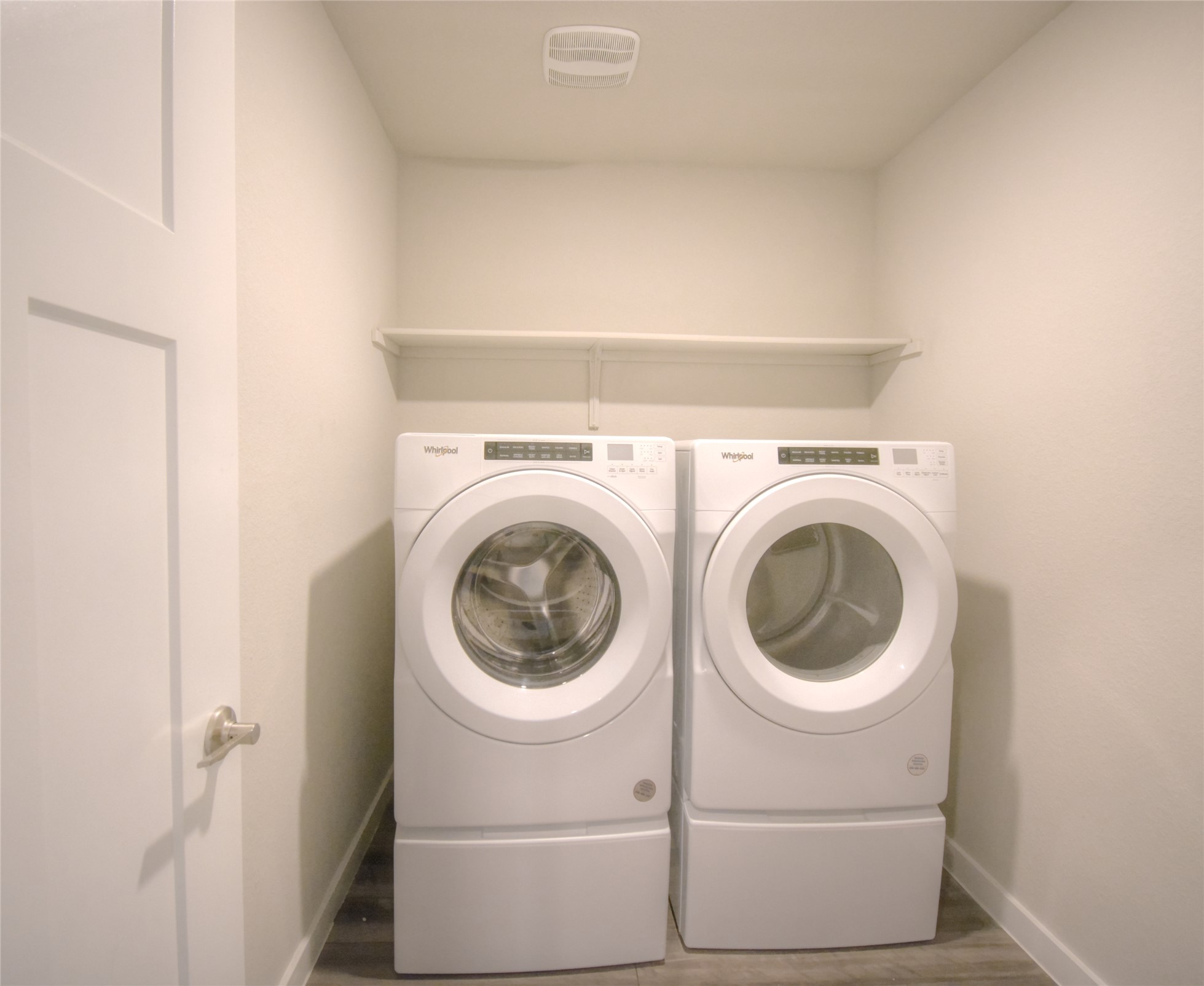 1137 Tipton Street Georgetown, TX 78633 - Photo 11 of 18 Laundry area featuring independent washer and dryer and light wood-style flooring