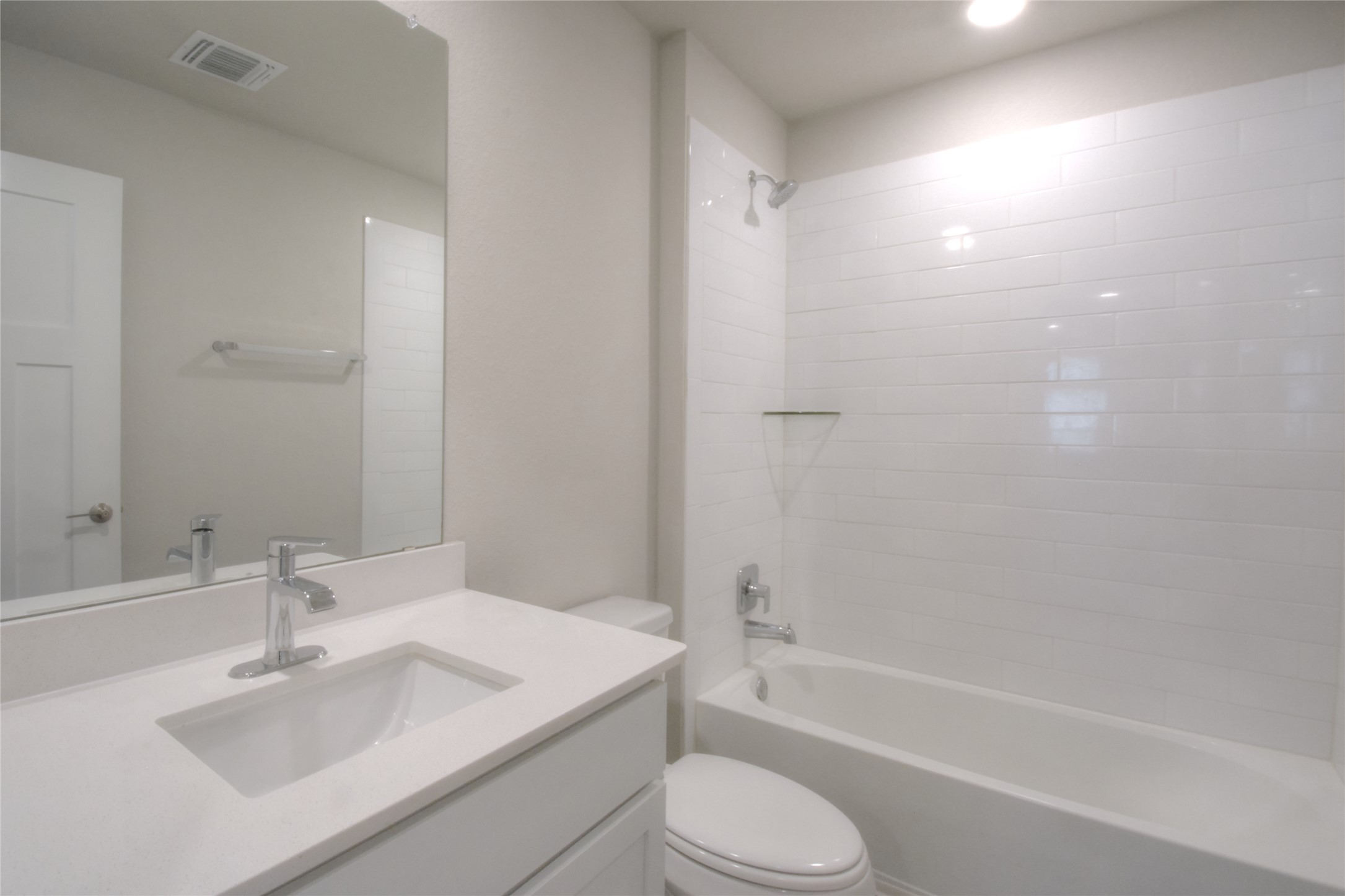 1137 Tipton Street Georgetown, TX 78633 - Photo 12 of 18 Bathroom with vanity, tub / shower combination, and recessed lighting