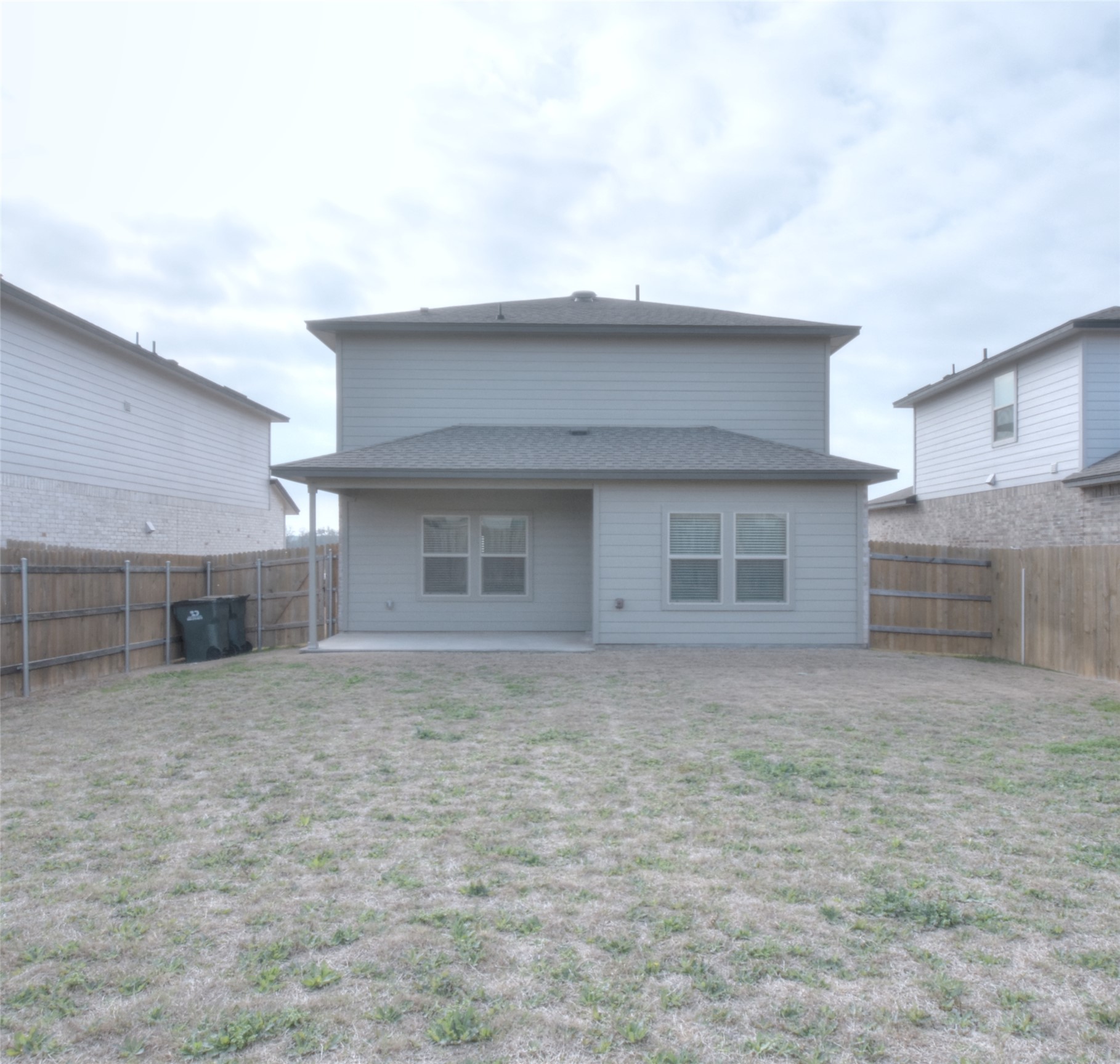 1137 Tipton Street Georgetown, TX 78633 - Photo 14 of 18 Back of house with a fenced backyard and a patio