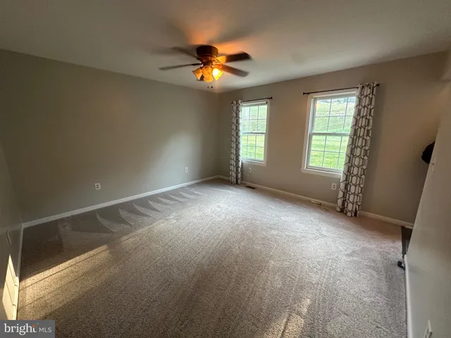 a bathroom with a toilet and a sink