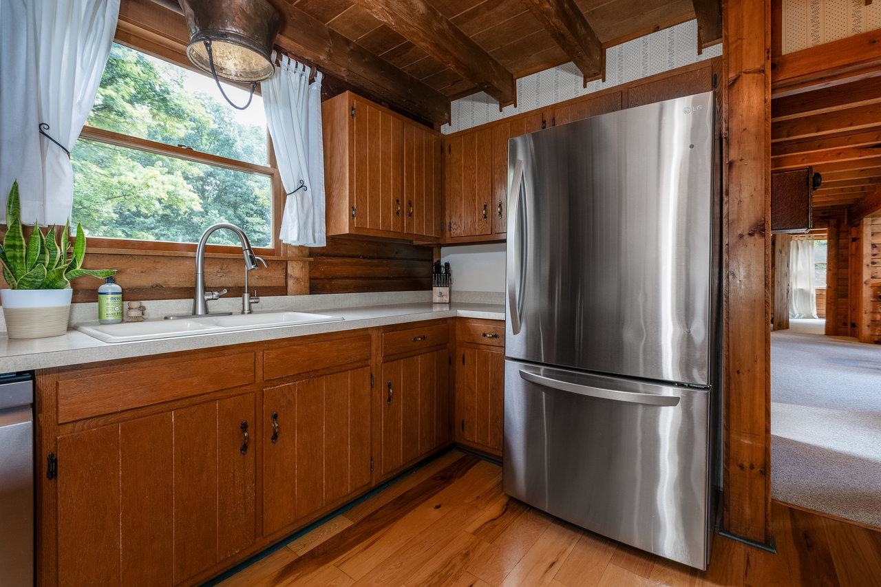 3193 Taylor Spring Lane Harrisonburg, VA 22801 - Photo 16 of 61 a kitchen with stainless steel appliances granite countertop a refrigerator and a sink