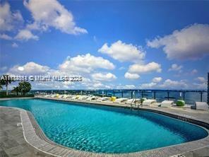 Edgewater Miami, FL 33137 - Photo 1 of 2 a view of a swimming pool is in the middle of a lake