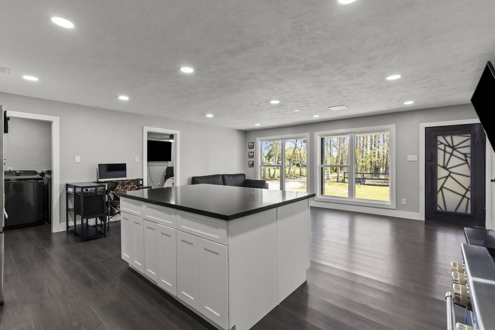 5406 South Tower Road Santa Fe, TX 77517 - Photo 16 of 46 a living room with furniture and a flat screen tv