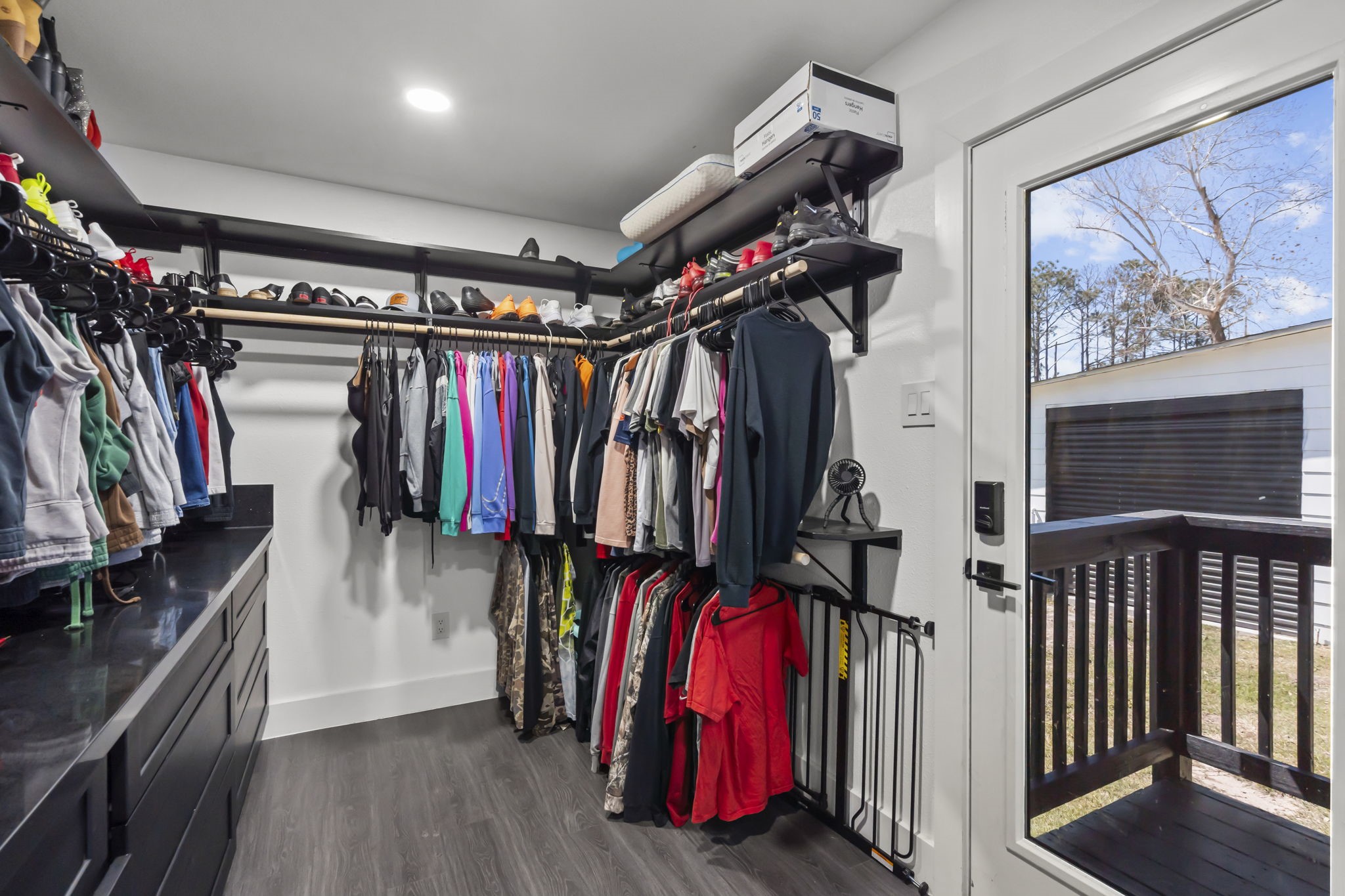5406 South Tower Road Santa Fe, TX 77517 - Photo 24 of 46 a view of walk in closet with clothes