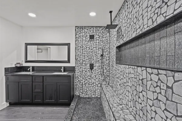 a living room with a walk in closet and a couch