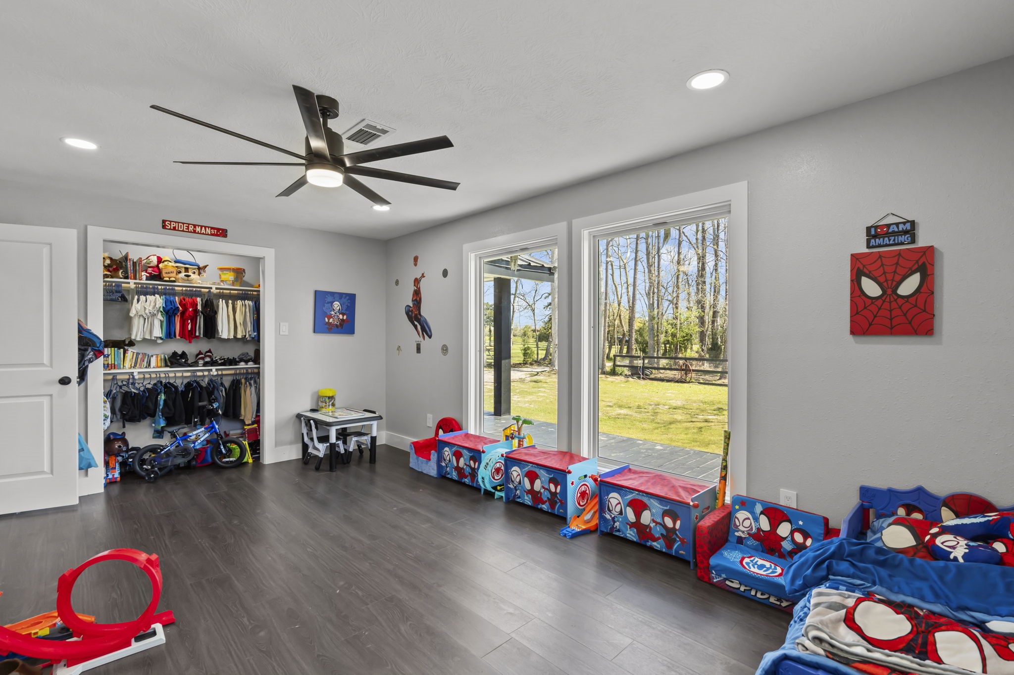 5406 South Tower Road Santa Fe, TX 77517 - Photo 31 of 46 a kids room that has a bed and a window