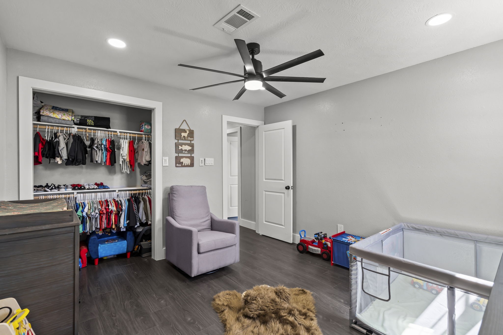 5406 South Tower Road Santa Fe, TX 77517 - Photo 35 of 46 a living room with furniture and a wooden floor