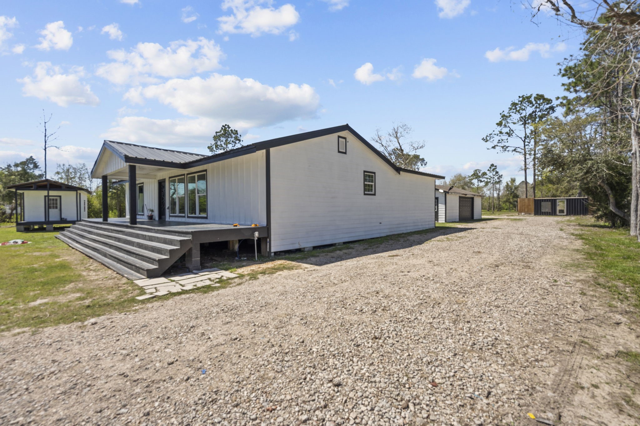 5406 South Tower Road Santa Fe, TX 77517 - Photo 36 of 46 a view of a house with a yard