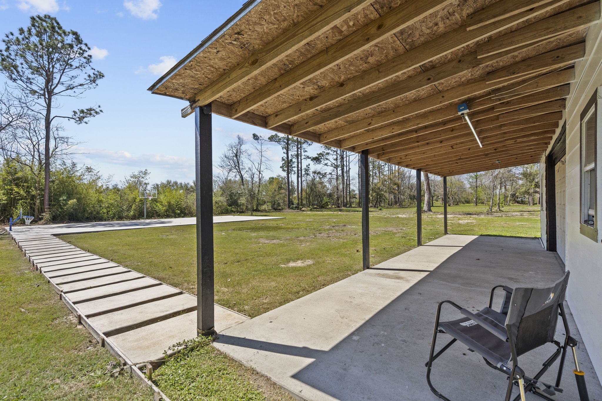 5406 South Tower Road Santa Fe, TX 77517 - Photo 37 of 46 a view of swimming pool with porch and patio