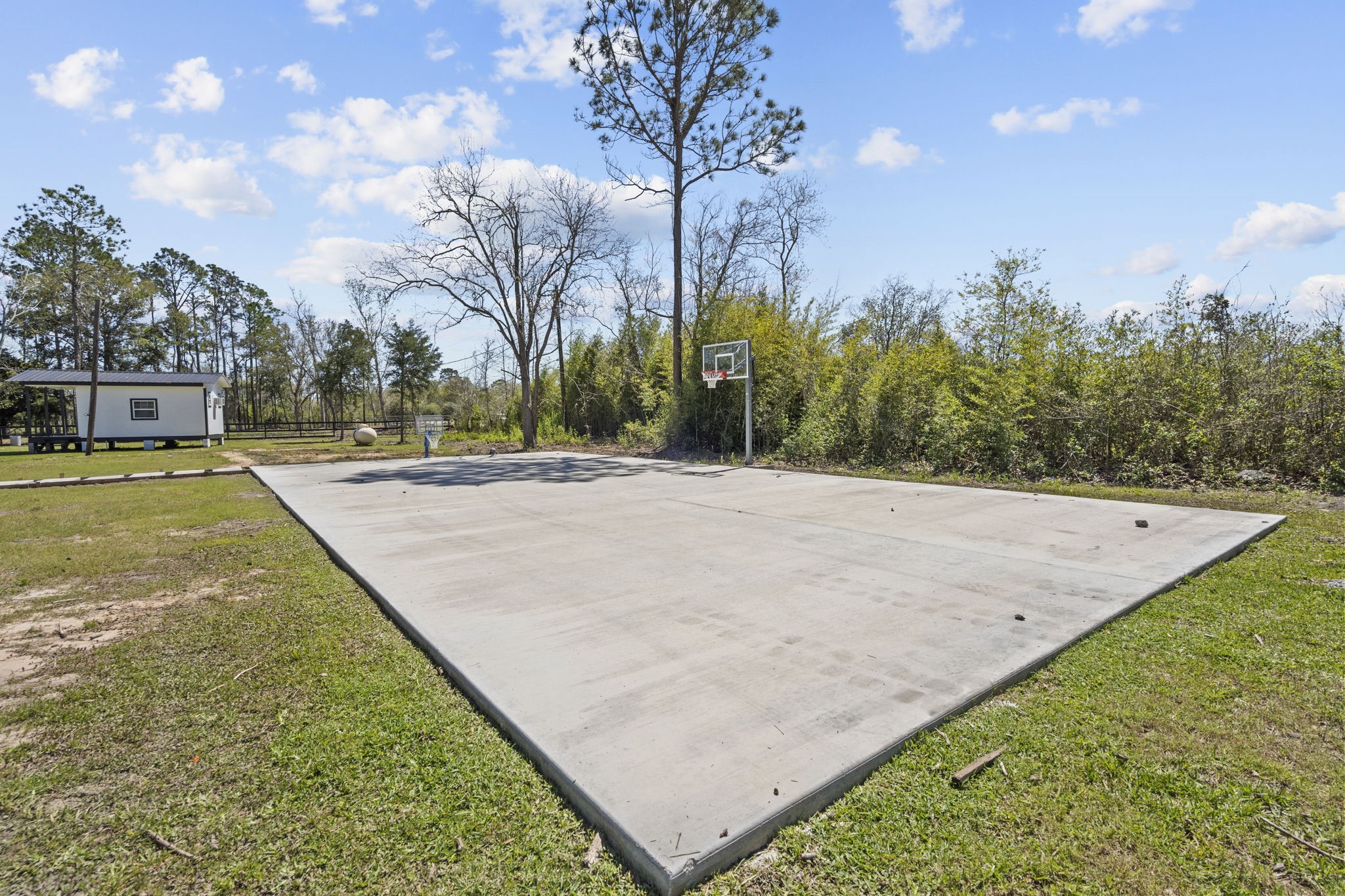 5406 South Tower Road Santa Fe, TX 77517 - Photo 40 of 46 a view of an outdoor space and tennis court