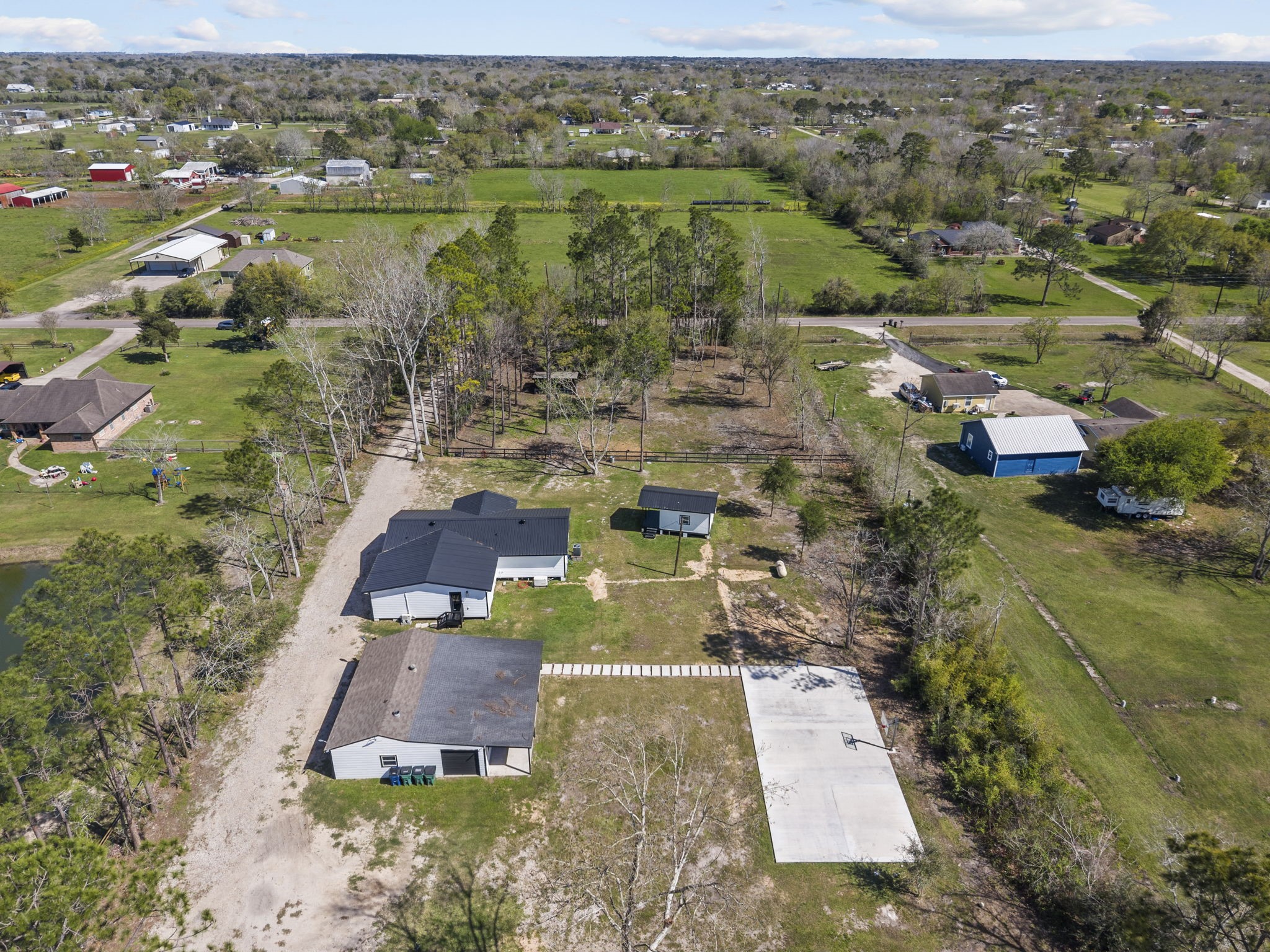 5406 South Tower Road Santa Fe, TX 77517 - Photo 42 of 46 an aerial view of residential houses with outdoor space