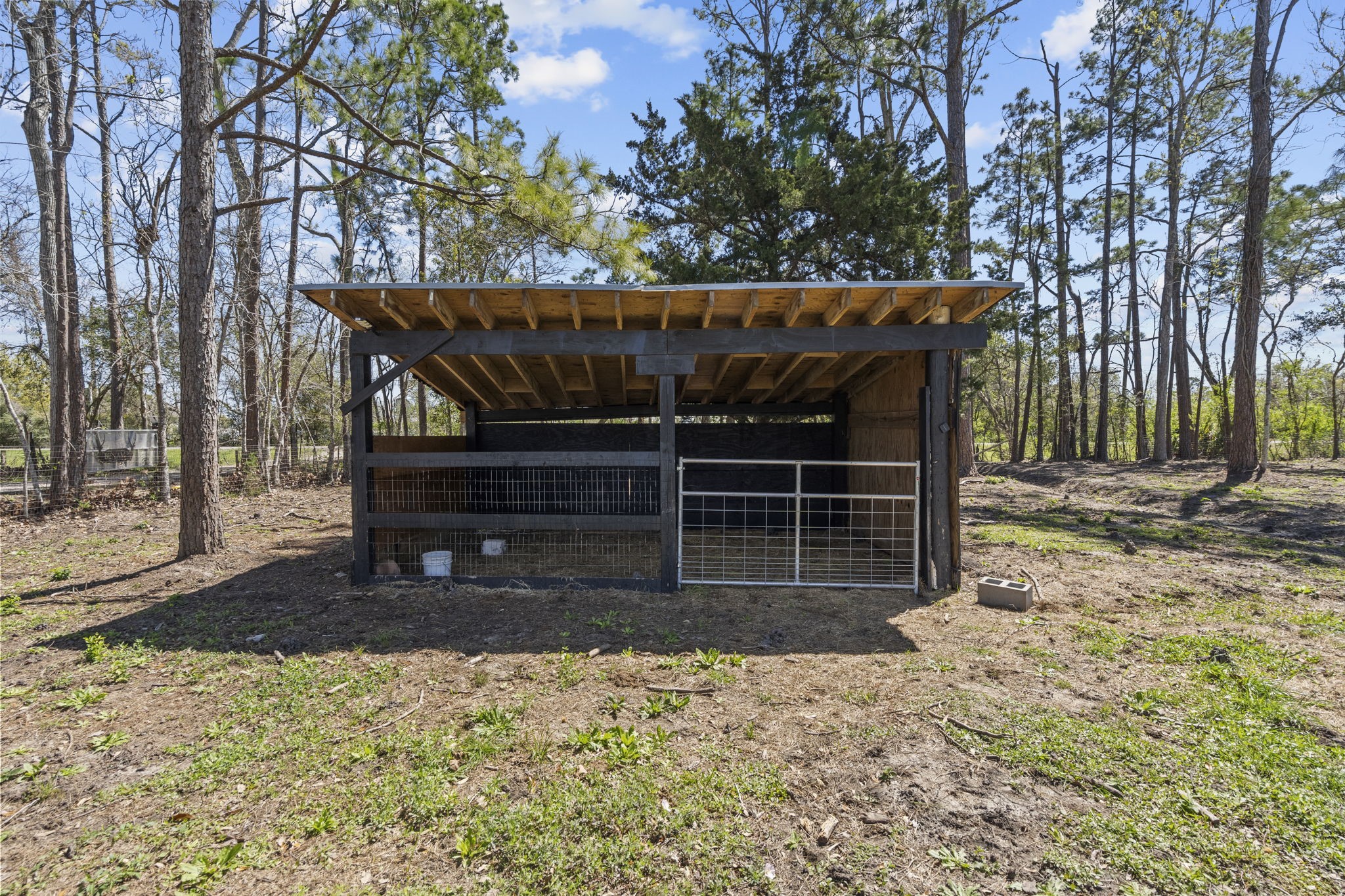 5406 South Tower Road Santa Fe, TX 77517 - Photo 45 of 46 a view of a house with a yard and wooden fence
