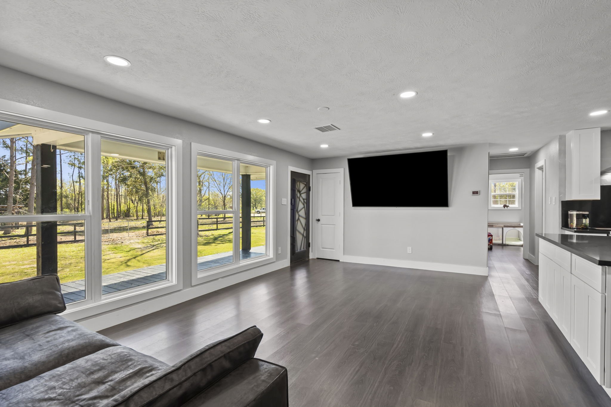 5406 South Tower Road Santa Fe, TX 77517 - Photo 9 of 46 a large living room with a large window