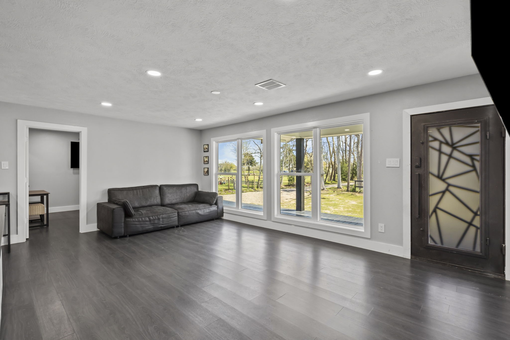 5406 South Tower Road Santa Fe, TX 77517 - Photo 10 of 46 a living room with furniture and a large window