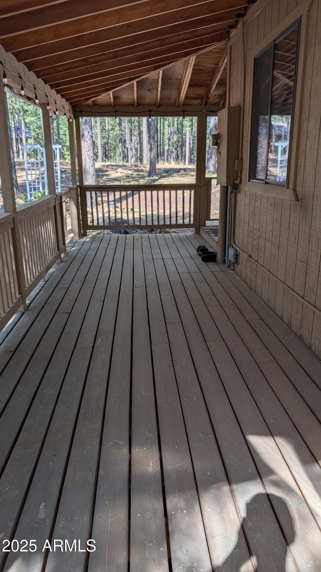 2425 Tall Trees Loop Forest Lakes, AZ 85931 - Photo 32 of 43 a view of backyard with wooden floor