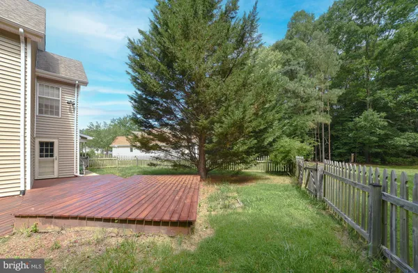 a view of a backyard with a garden