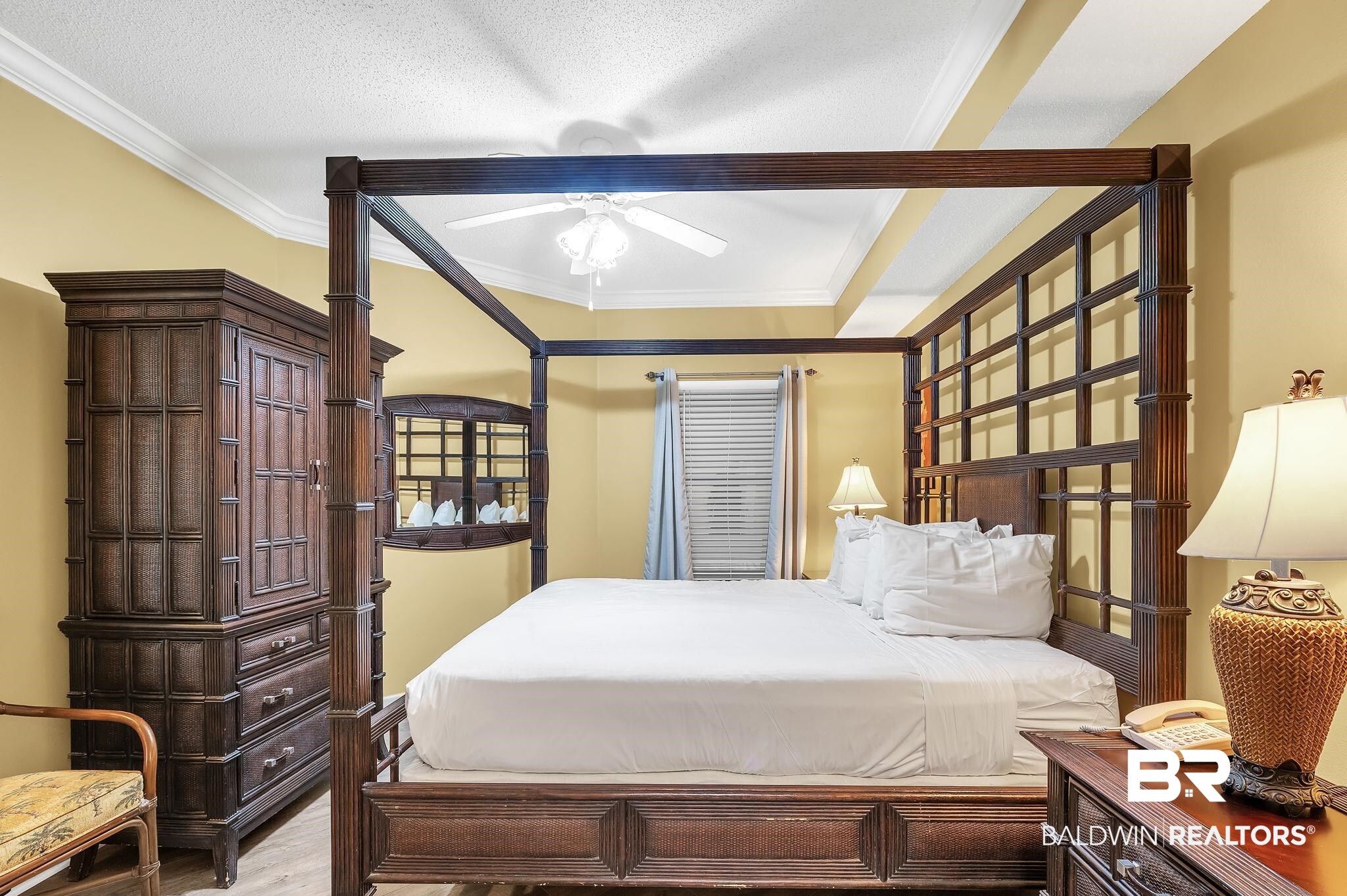 27580 Canal Road, Unit 1214 AND BOAT SLIP #62 Orange Beach, AL 36561 - Photo 26 of 67 Bedroom featuring crown molding and wood finished floors