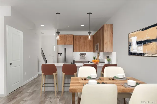 a view of a dining room with furniture